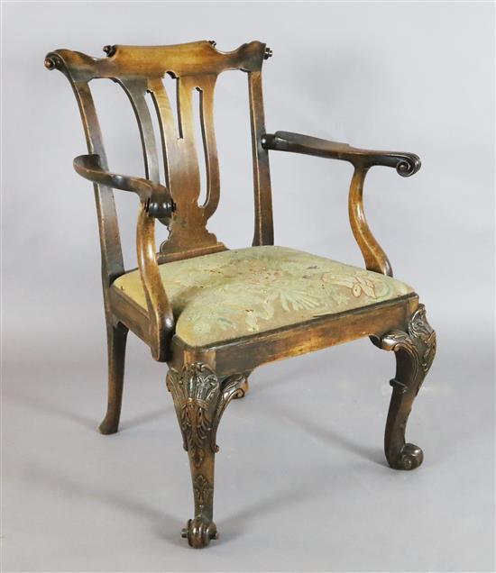 A George II red walnut elbow chair,